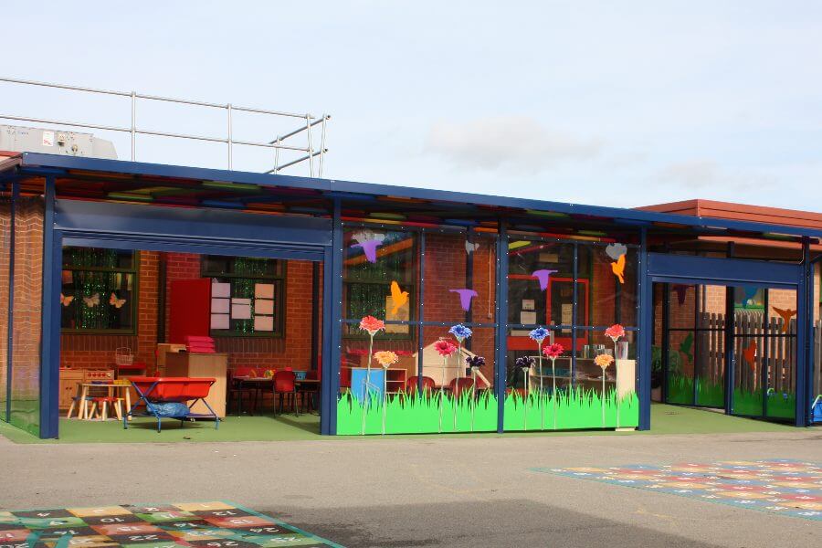 Blue Enclosed Shelter with Roller Shutters