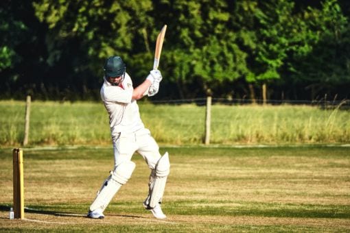 Man Playing Cricket