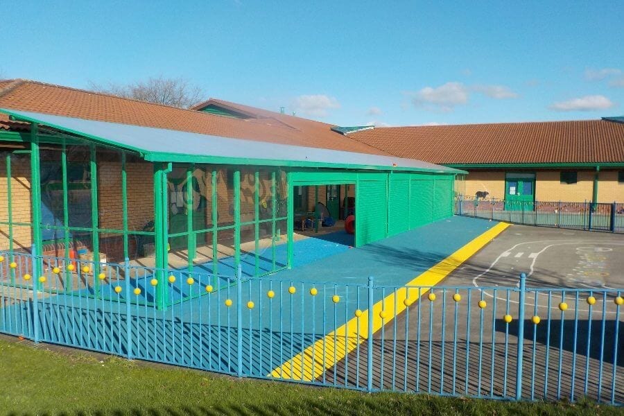 Green Enclosed Canopy with Roller Shutters