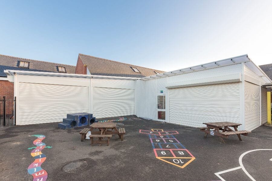 White Enclosed Canopy with Roller Shutters