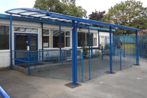 Blue playground shelter we fitted at Christ Church School