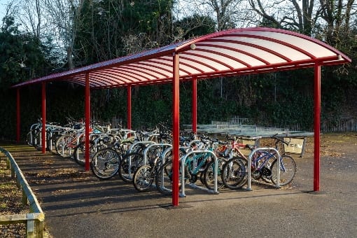 Curved roof cycle shelter we designed for Myton School