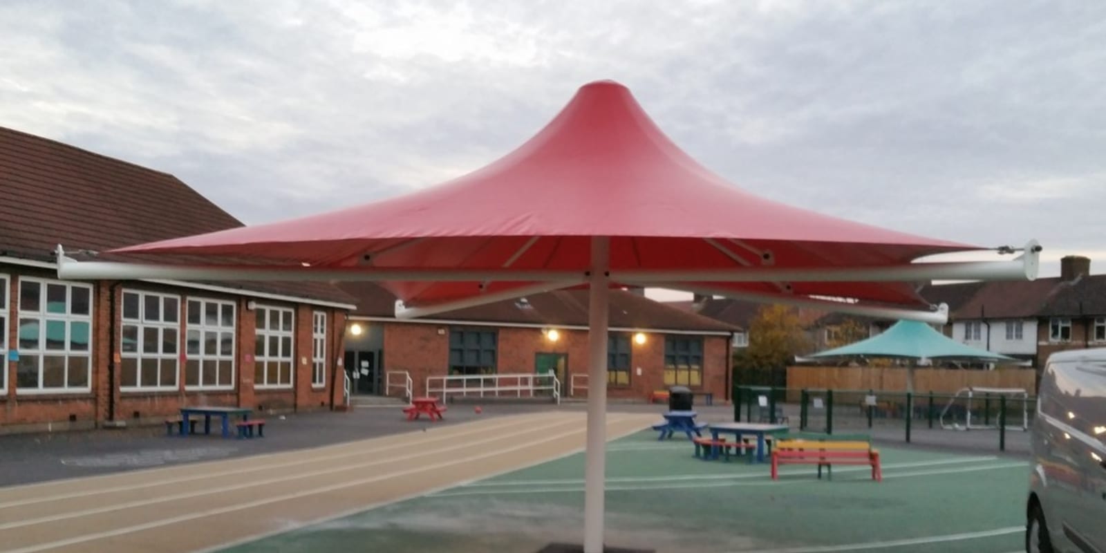 Sydney Russell School Red Umbrella Shelter