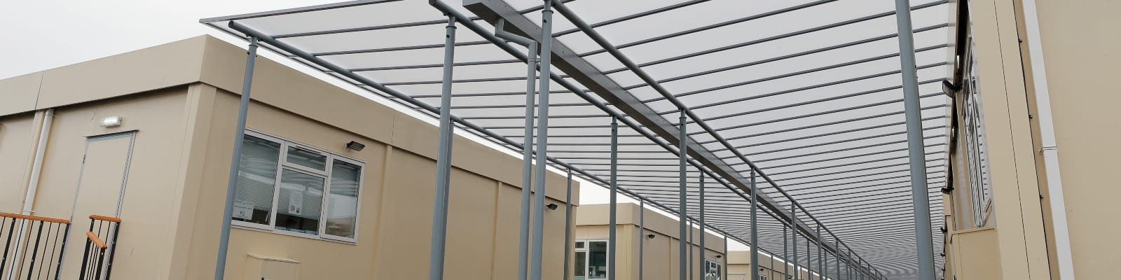 Newman School Straight Roof Shelters