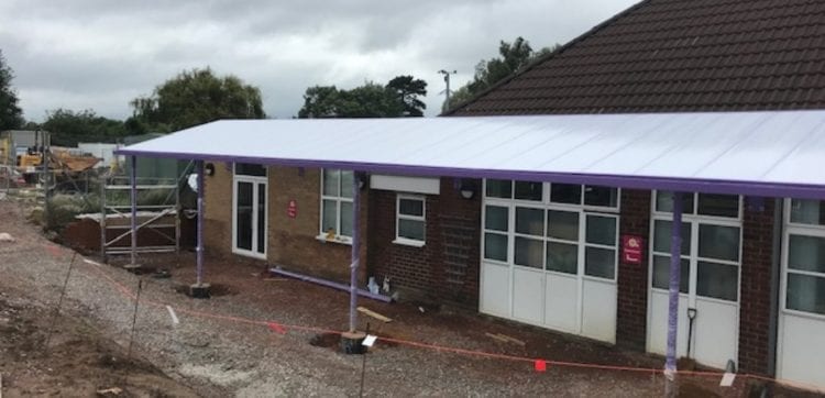 Purple frame canopy we designed for Finlay School