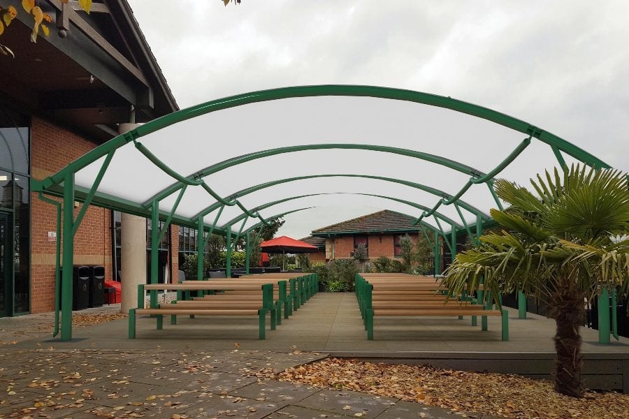 Green fabric roof dining area shelter