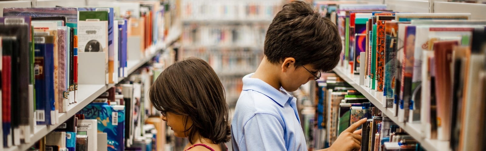 Children Browsing Library Books