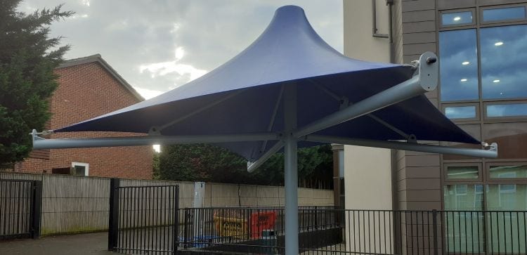 Blue fabric shelter we designed for Glebe School
