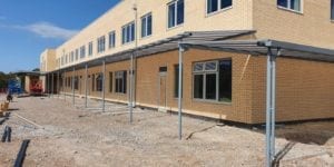 Straight roof canopies we made for Kings School