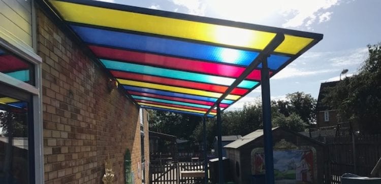 Colourful polycarbonate roof shelter at Hatfield Peverel School