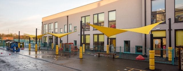Yellow shade sails we made for Glenwood School