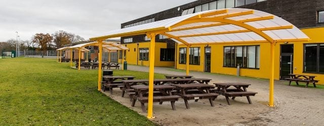 Curved roof canopies we designed for Waingels College