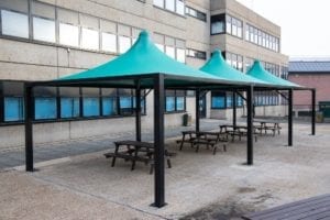 Green tepee canopies we designed for Shooters Hill College
