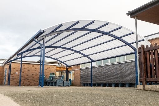 Curved roof shelter we added to The Corbet School