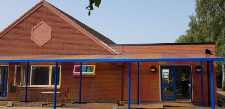 Colourful roof canopy we designed for Orchard Primary School