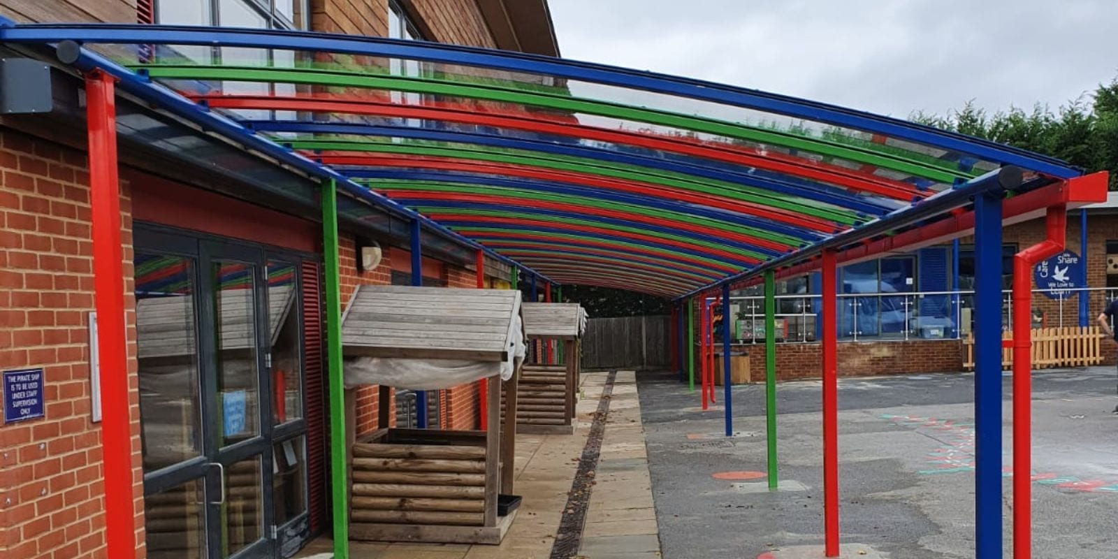 Curved roof canopy we designed for Danes Hill School
