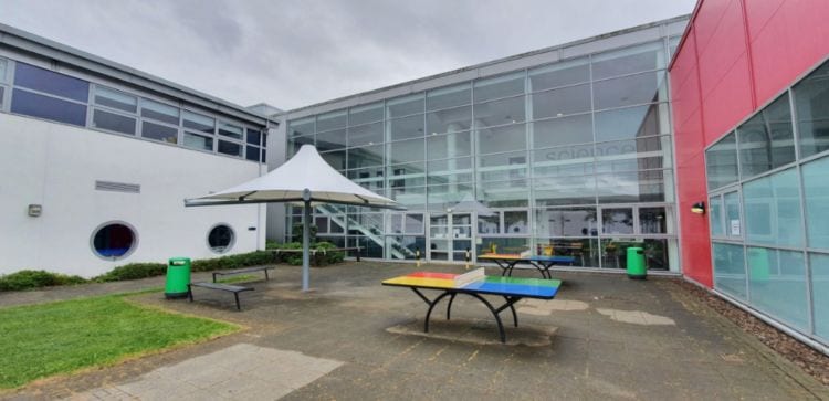 Fabric umbrella canopy we installed at Haughton Academy