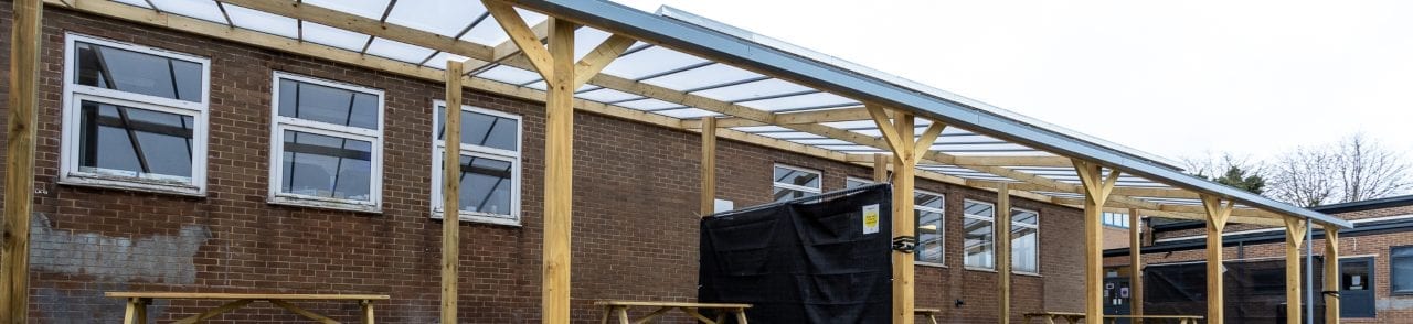 Timber playground shelter we installed at Handsworth Wood School