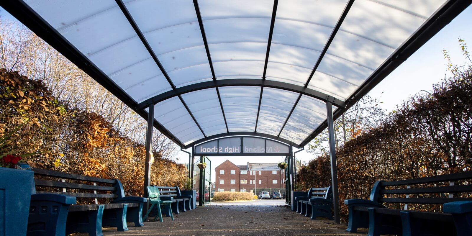 Covered walkway canopy we designed for Melland High School