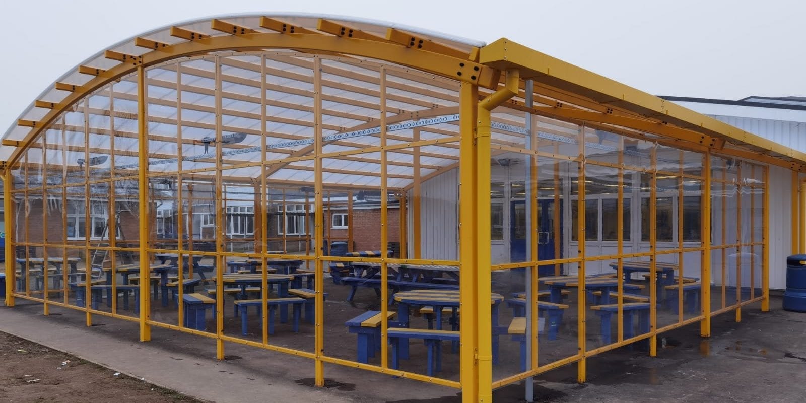 Curved roof shelter we designed for St Benedict's Catholic College
