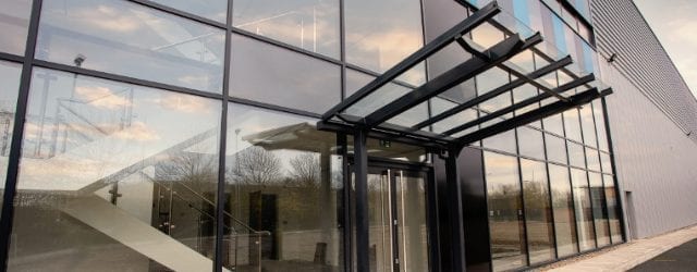 Glass door canopy we designed for Estuary Boulevard