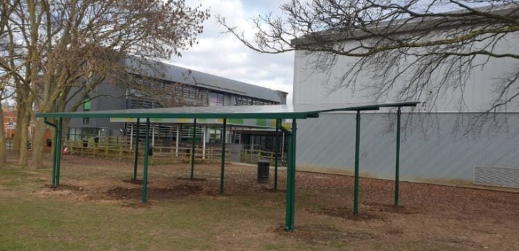 Straight roof shelter we designed for Uxbridge High School