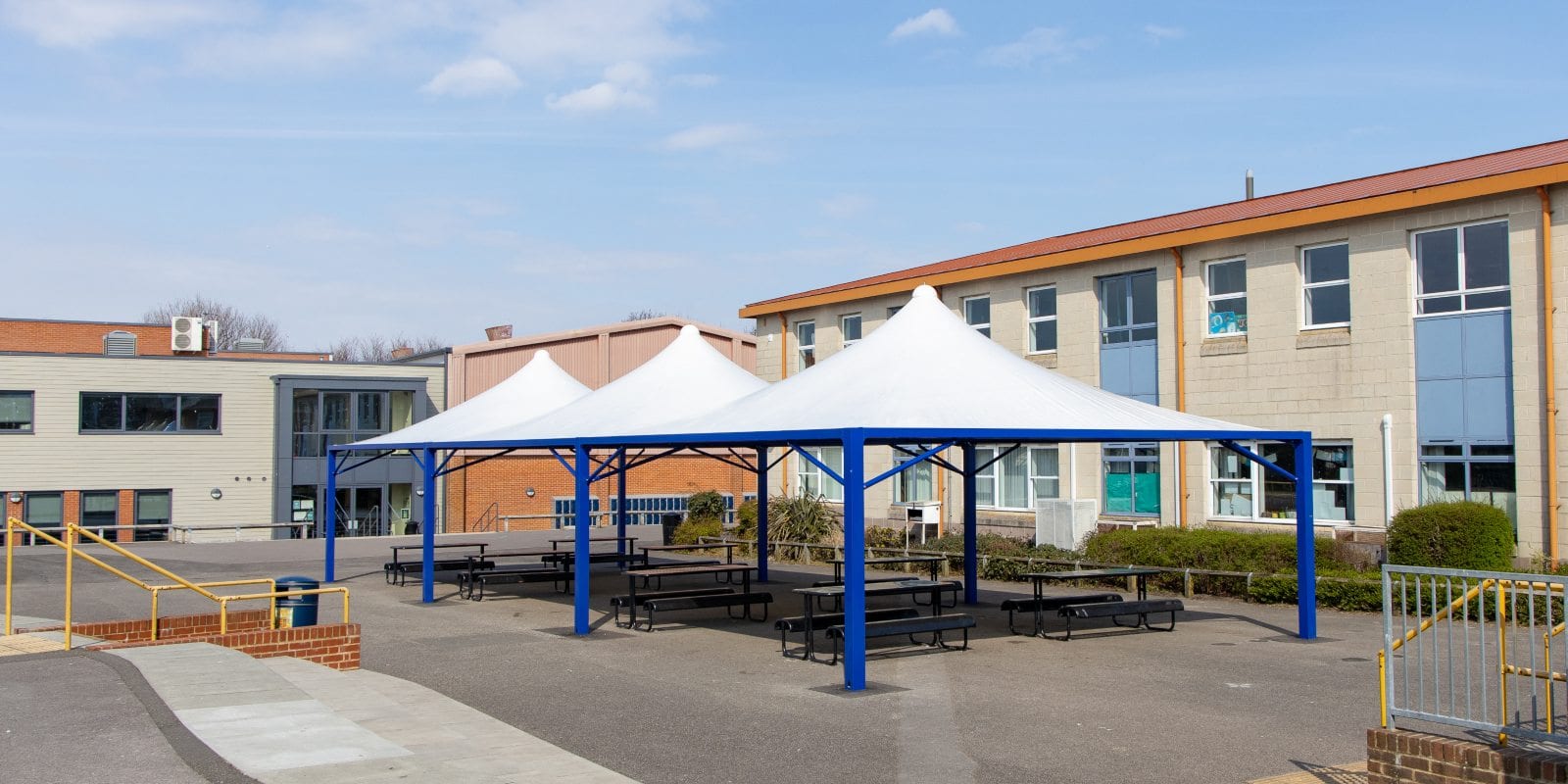 Fabric tepee structures we designed for The Harvey Grammar School