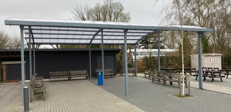 Curved roof shelter we installed at Wye School