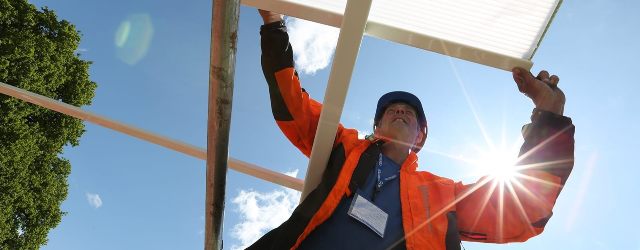 man-constructing-canopy