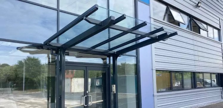 Straight roof entrance canopy we designed for Tudor Road Business Park