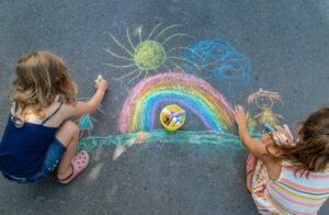 children doing chalk art children doing chalk art